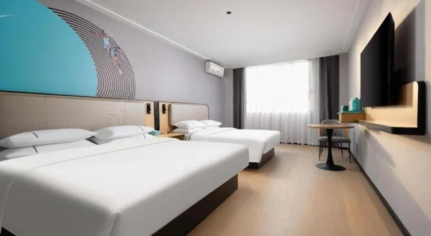 Bed in City Comfort Inn Wuhan Dongwu Avenue Light Rail Station