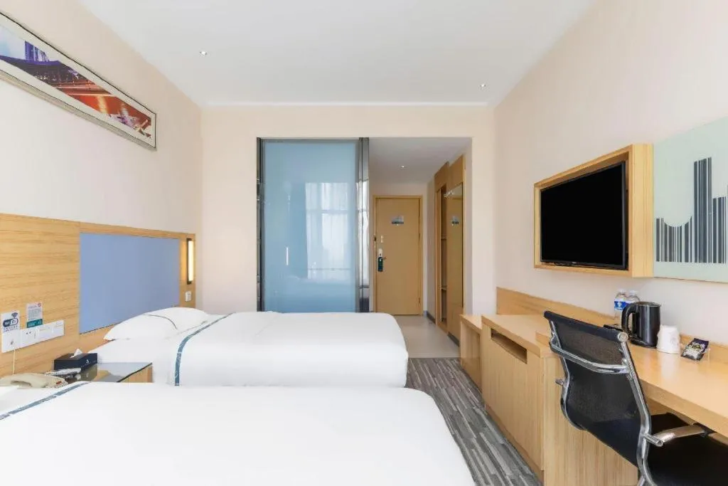 Bed in City Comfort Inn Wuhan Dongwu Avenue Light Rail Station