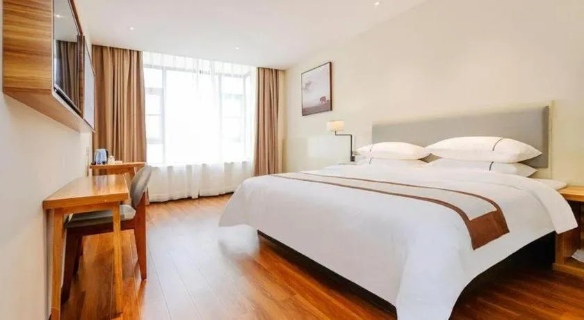 Bed in JTOUR Inn Hechi Yizhou Municipal Central Plaza