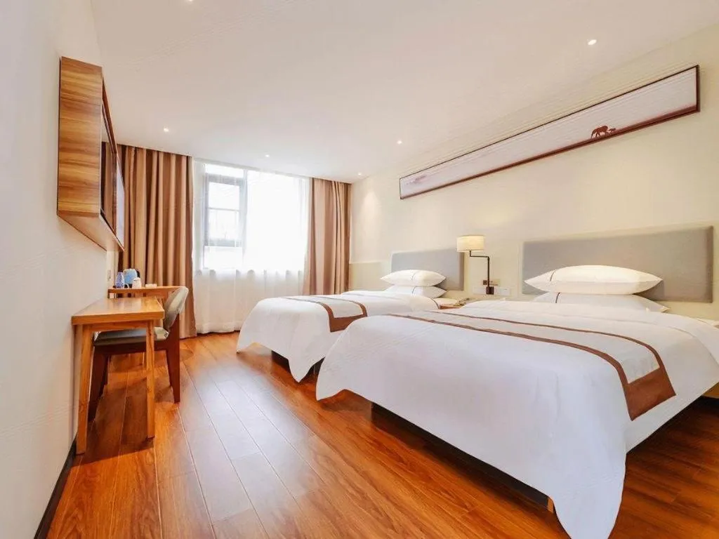 Bed in JTOUR Inn Hechi Yizhou Municipal Central Plaza