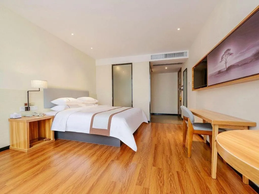 Bed in JTOUR Inn Hechi Yizhou Municipal Central Plaza