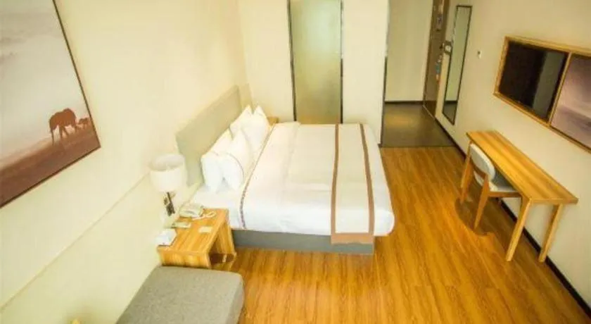 Bed in JTOUR Inn Hechi Yizhou Municipal Central Plaza