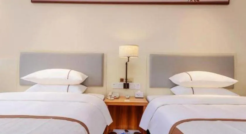 Bed in JTOUR Inn Hechi Yizhou Municipal Central Plaza