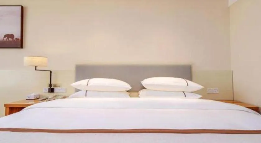 Bed in JTOUR Inn Hechi Yizhou Municipal Central Plaza
