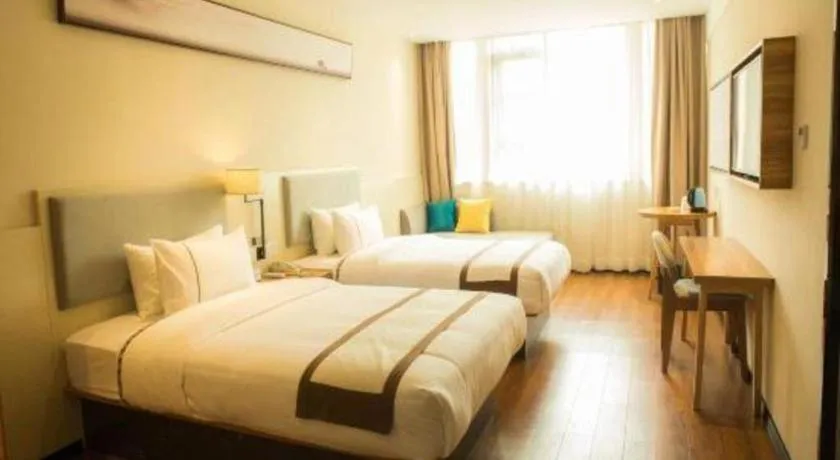 Bed in JTOUR Inn Hechi Yizhou Municipal Central Plaza