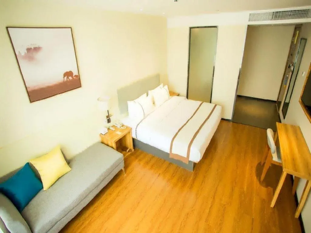 Bed in JTOUR Inn Hechi Yizhou Municipal Central Plaza