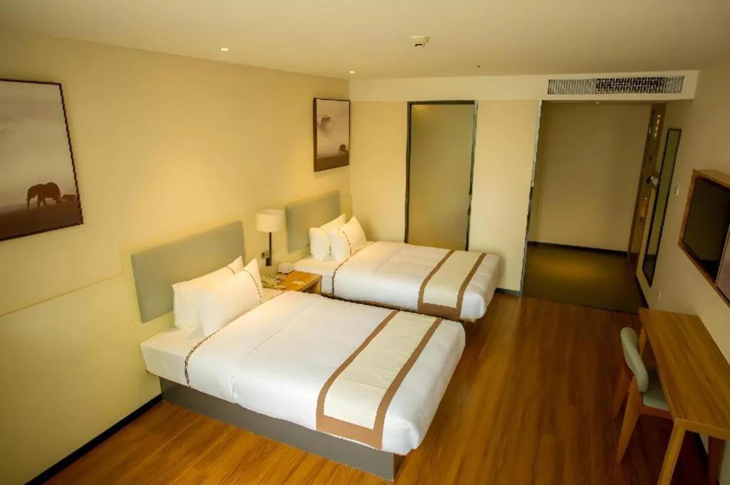 Bed in JTOUR Inn Hechi Yizhou Municipal Central Plaza