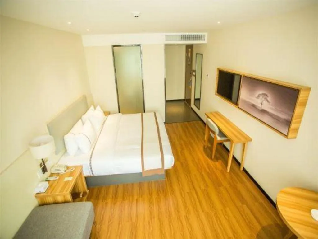 Bed in JTOUR Inn Hechi Yizhou Municipal Central Plaza