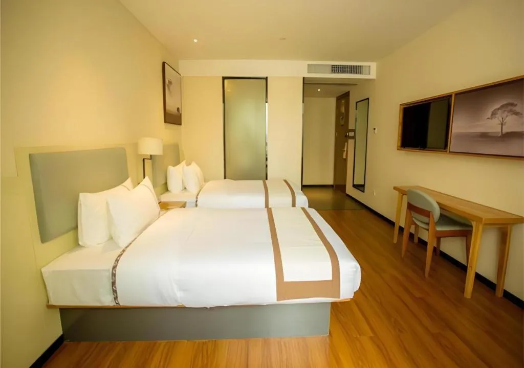 Bed in JTOUR Inn Hechi Yizhou Municipal Central Plaza