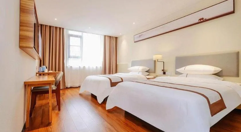 Bed in JTOUR Inn Hechi Yizhou Municipal Central Plaza