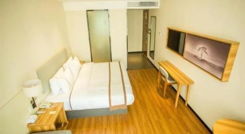 Bed in JTOUR Inn Hechi Yizhou Municipal Central Plaza