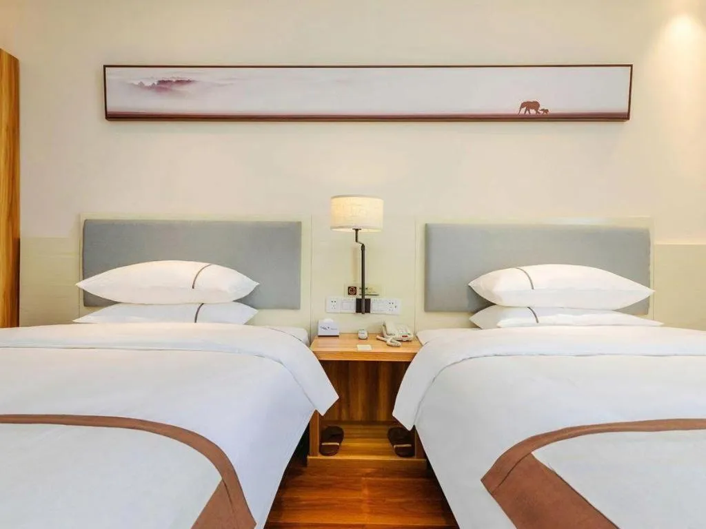 Bed in JTOUR Inn Hechi Yizhou Municipal Central Plaza