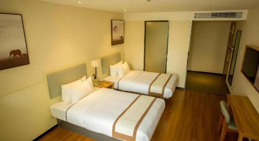 Bed in JTOUR Inn Hechi Yizhou Municipal Central Plaza