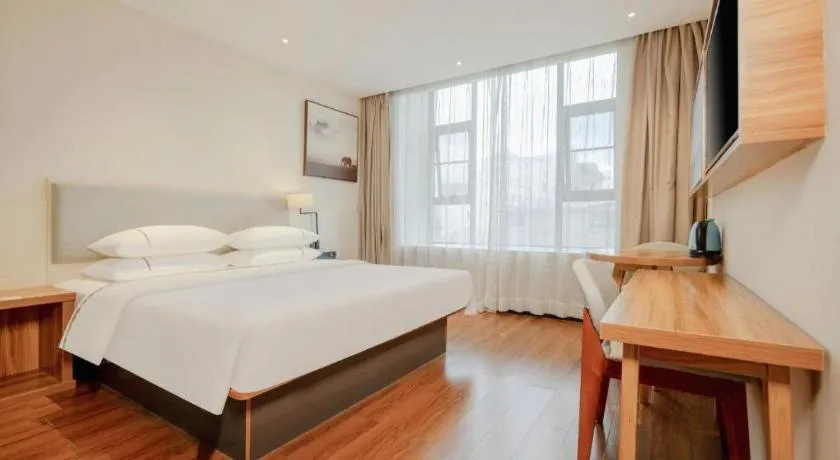 Bed in JTOUR Inn Hechi Yizhou Municipal Central Plaza