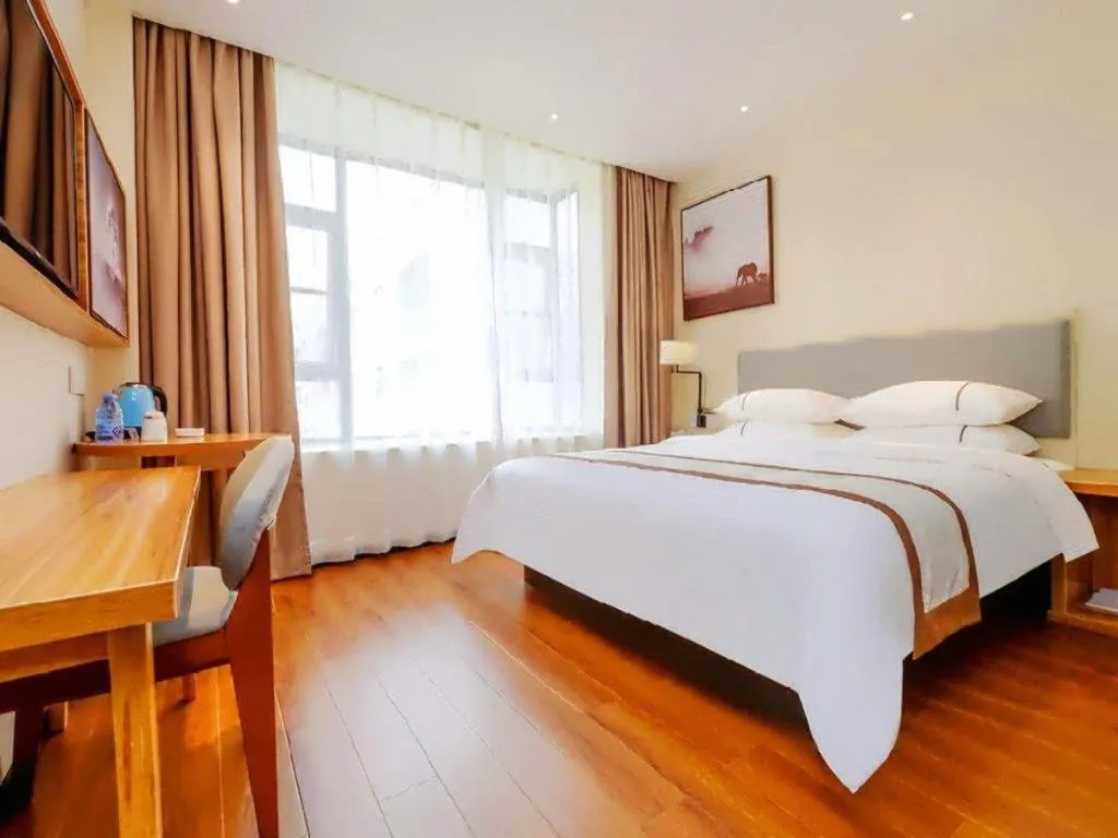 Bed in JTOUR Inn Hechi Yizhou Municipal Central Plaza