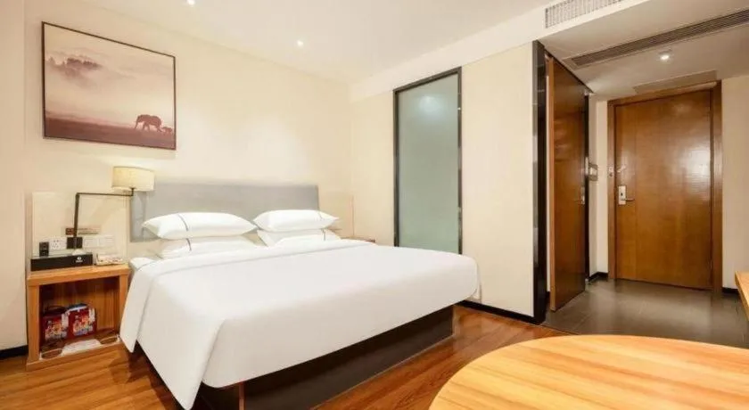 Bed in JTOUR Inn Hechi Yizhou Municipal Central Plaza