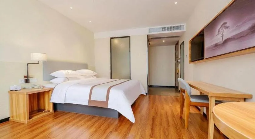 Bed in JTOUR Inn Hechi Yizhou Municipal Central Plaza