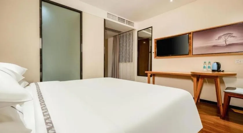 Bed in JTOUR Inn Hechi Yizhou Municipal Central Plaza