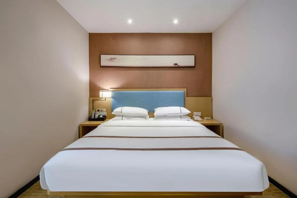 Bed in JTOUR Inn Hechi Yizhou Municipal Central Plaza