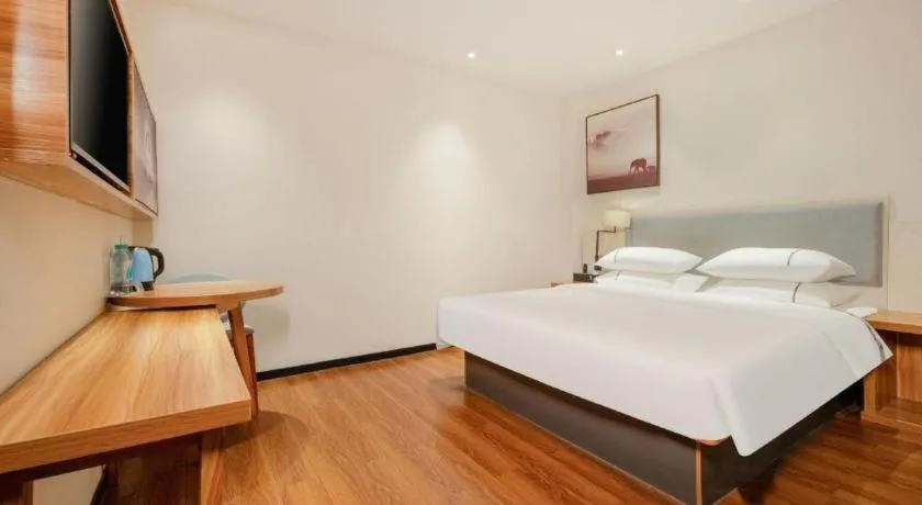 Bed in JTOUR Inn Hechi Yizhou Municipal Central Plaza