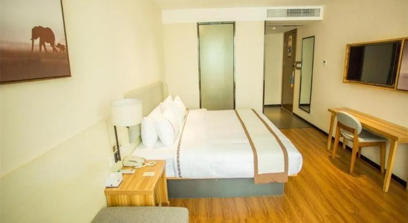 Bed in JTOUR Inn Hechi Yizhou Municipal Central Plaza