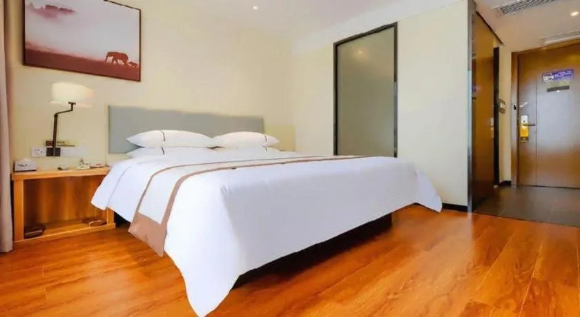 Bed in JTOUR Inn Hechi Yizhou Municipal Central Plaza