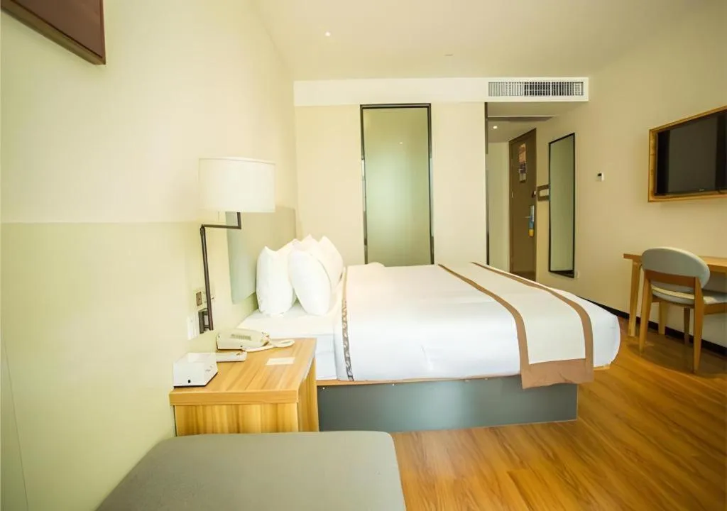 Bed in JTOUR Inn Hechi Yizhou Municipal Central Plaza