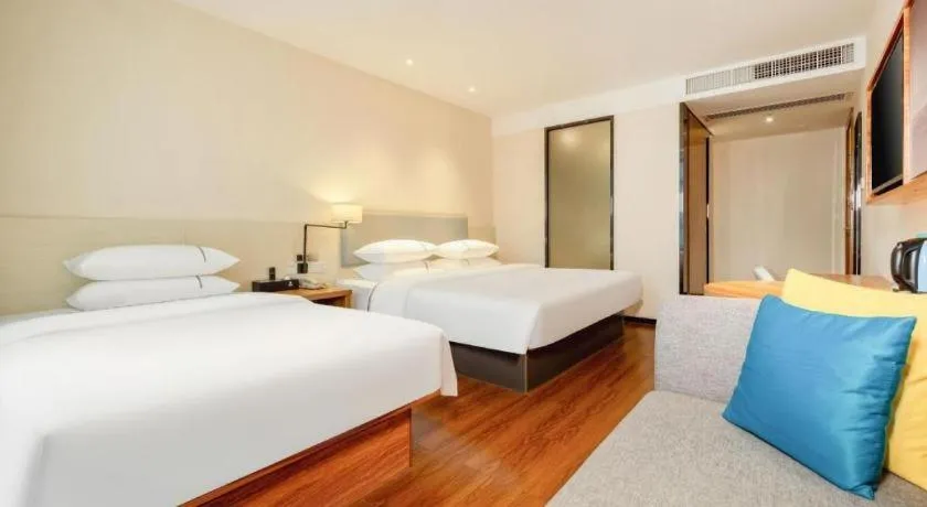 Bed in JTOUR Inn Hechi Yizhou Municipal Central Plaza