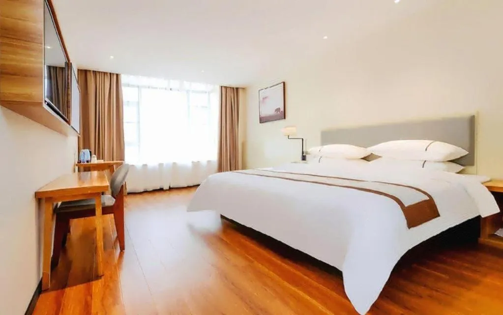 Bed in JTOUR Inn Hechi Yizhou Municipal Central Plaza