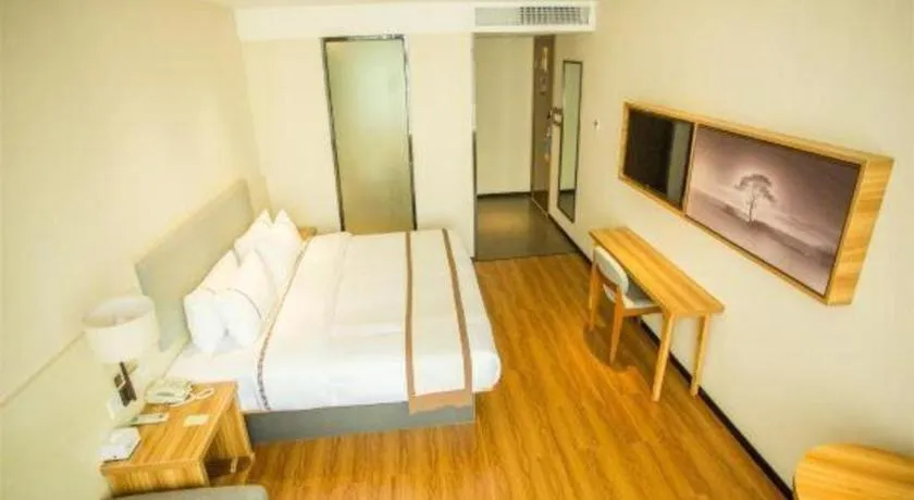 Bed in JTOUR Inn Hechi Yizhou Municipal Central Plaza