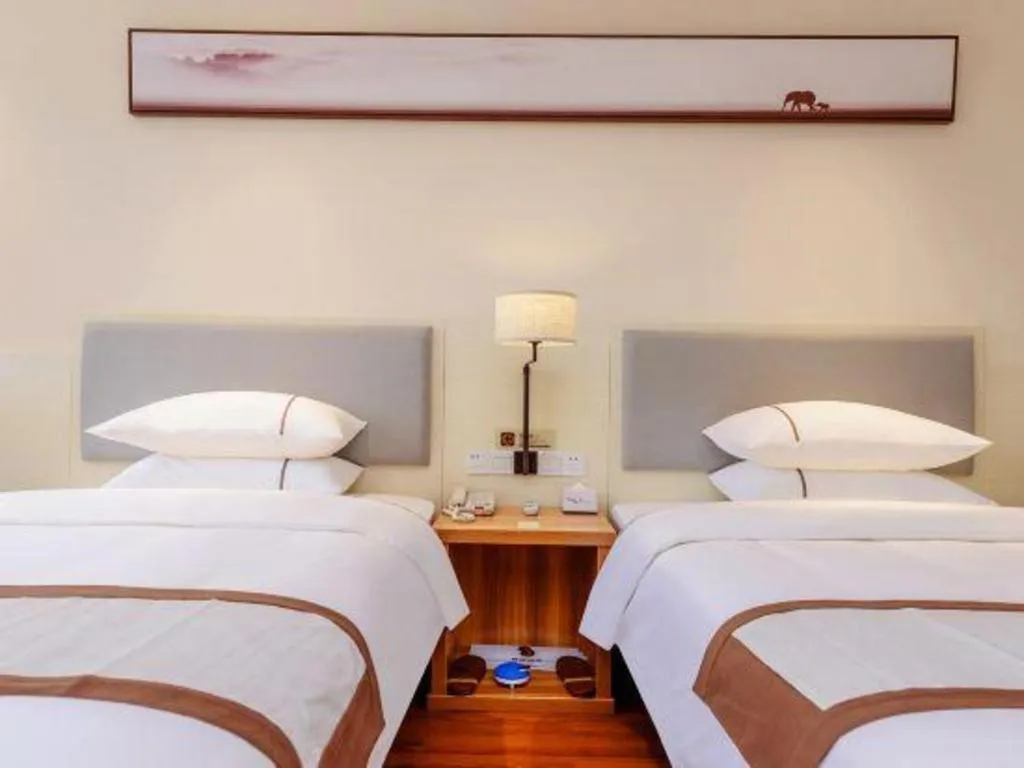 Bed in JTOUR Inn Hechi Yizhou Municipal Central Plaza