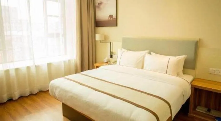 Bed in JTOUR Inn Hechi Yizhou Municipal Central Plaza