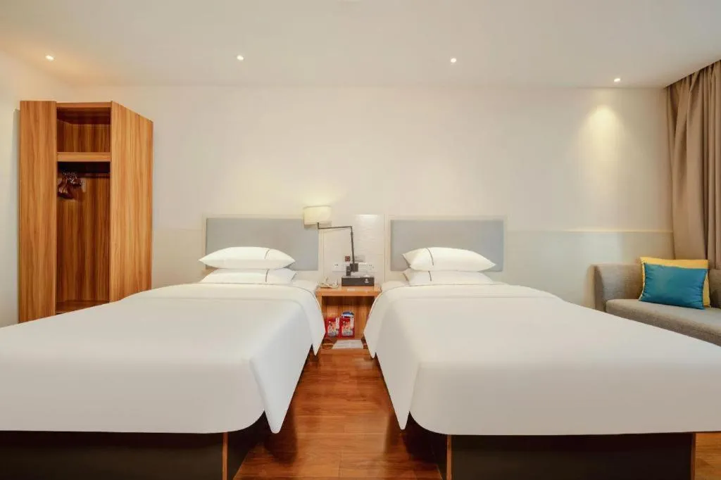 Bed in JTOUR Inn Hechi Yizhou Municipal Central Plaza