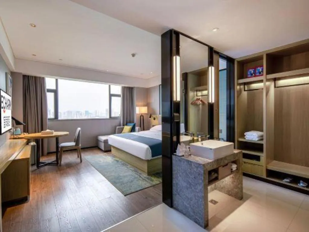 Bed in Echarm Hotel Nanning Chaoyang Square River View