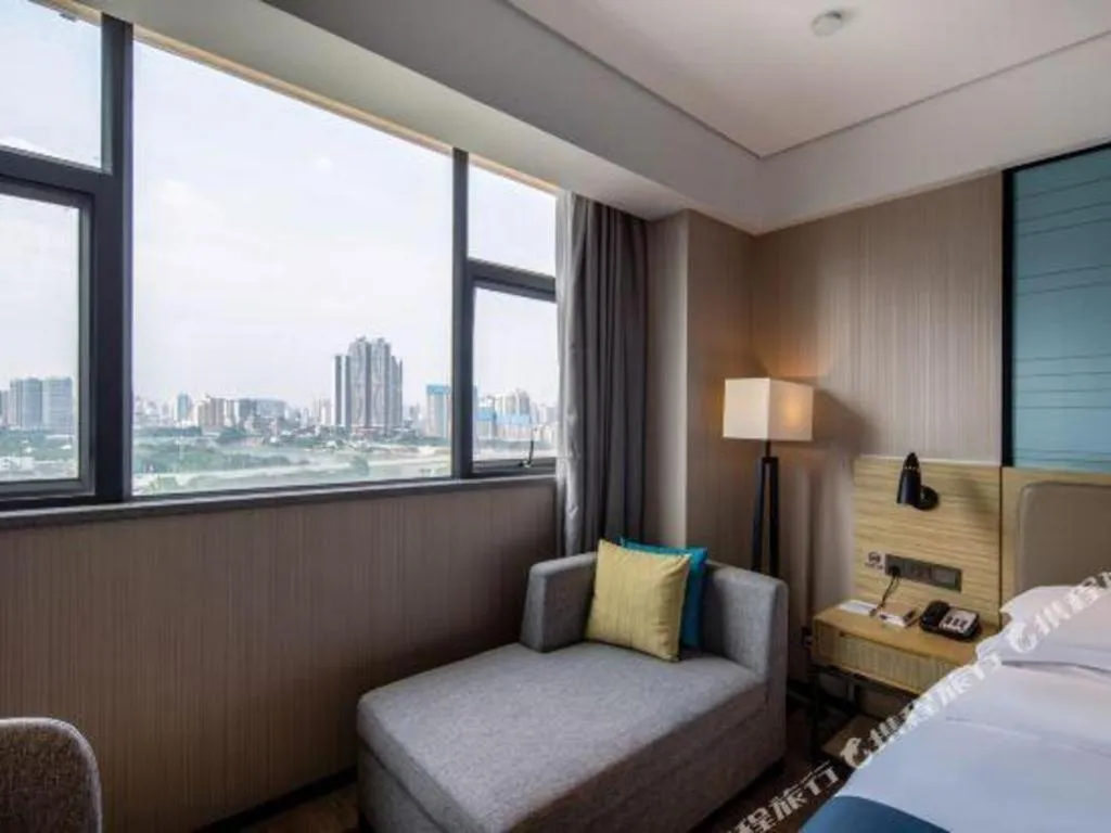Bed in Echarm Hotel Nanning Chaoyang Square River View