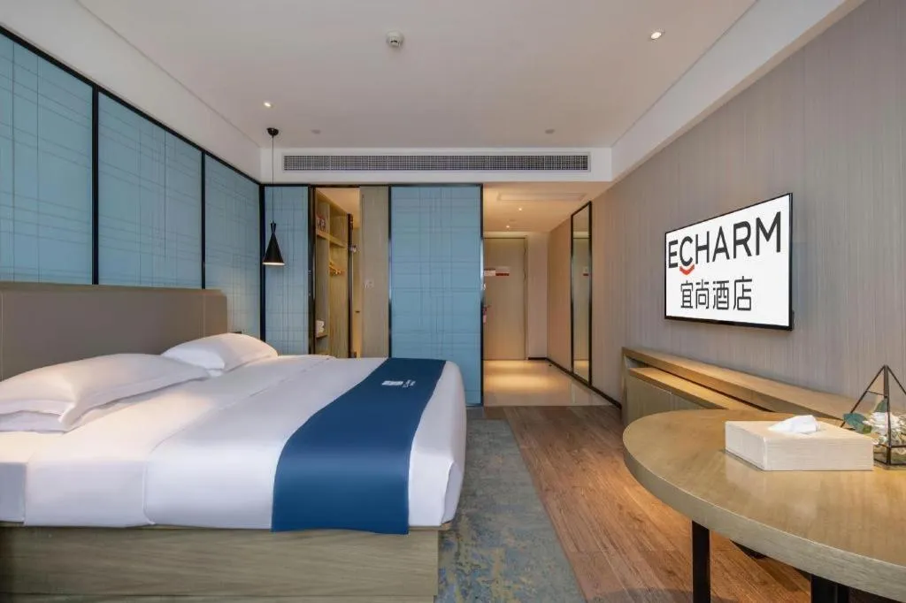 Bed in Echarm Hotel Nanning Chaoyang Square River View