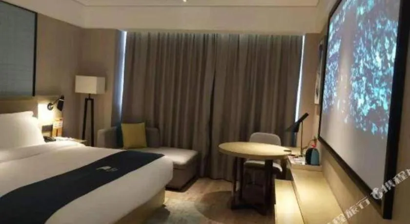 Bed in Echarm Hotel Nanning Chaoyang Square River View