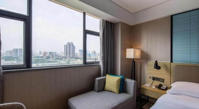 Bed in Echarm Hotel Nanning Chaoyang Square River View