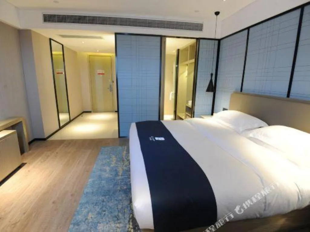 Bed in Echarm Hotel Nanning Chaoyang Square River View