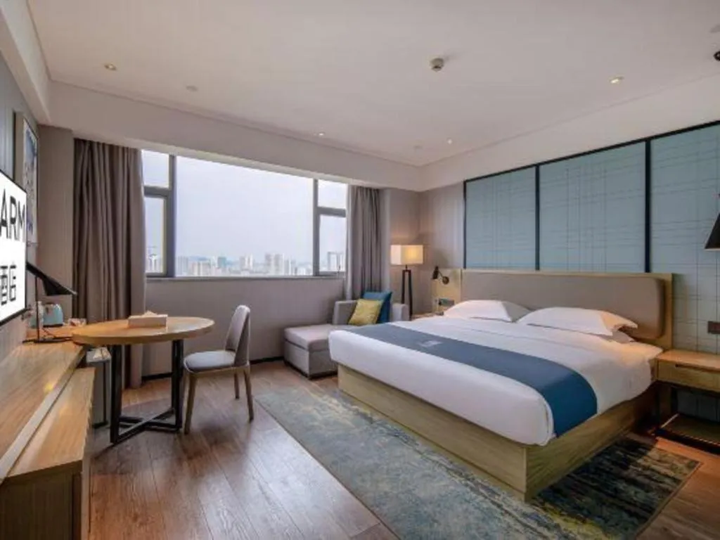 Bed in Echarm Hotel Nanning Chaoyang Square River View