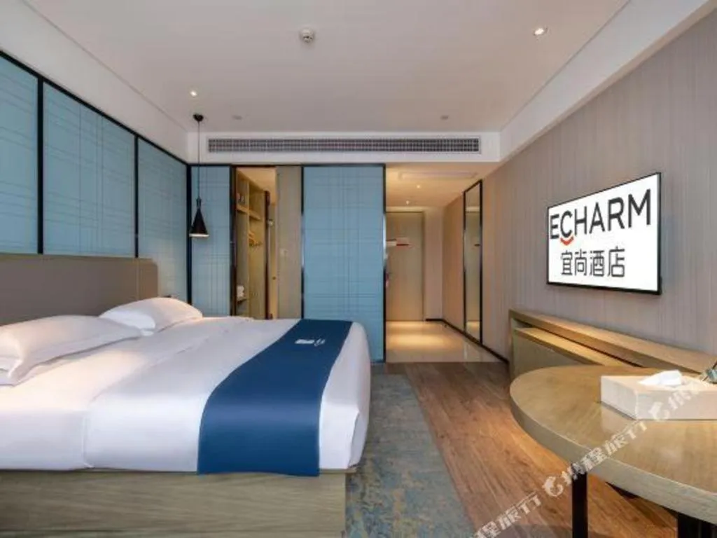 Bed in Echarm Hotel Nanning Chaoyang Square River View