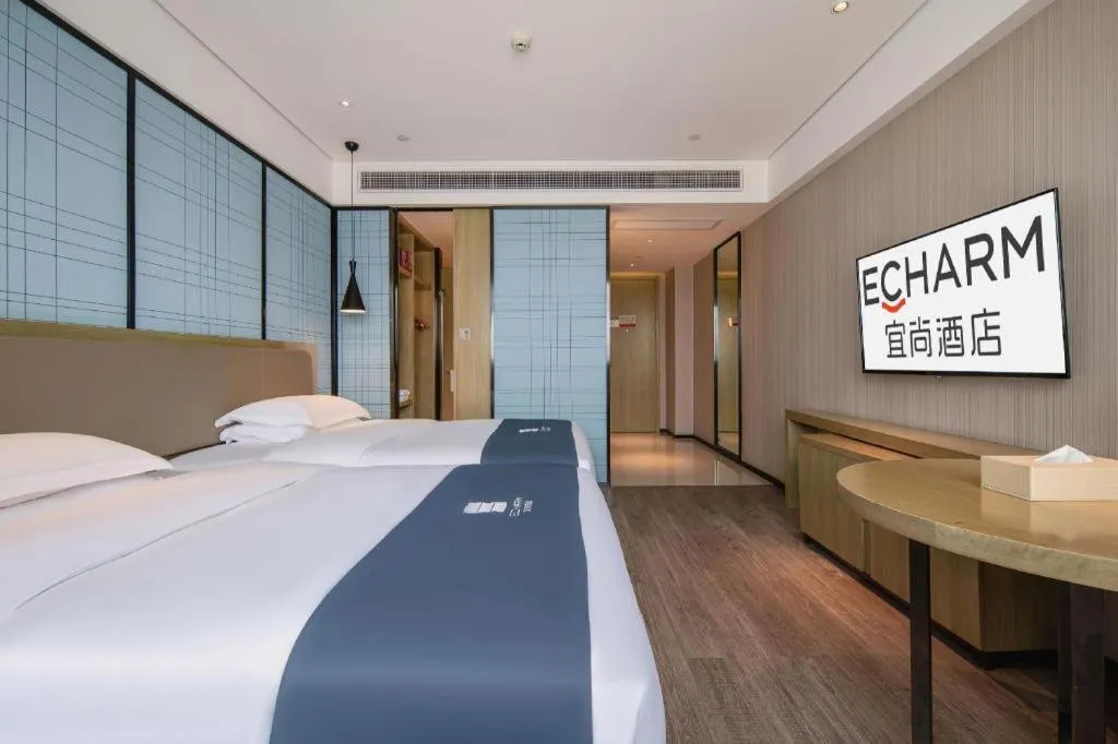 Bed in Echarm Hotel Nanning Chaoyang Square River View