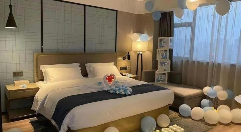 Bed in Echarm Hotel Nanning Chaoyang Square River View