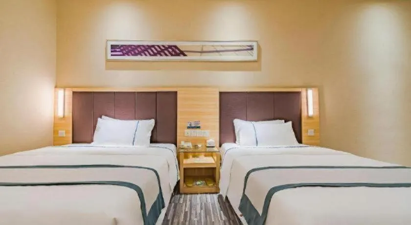 Bed in City Comfort Inn Guangzhou Shangxiajiu Hualin Temple Chenjiaci Metro Station