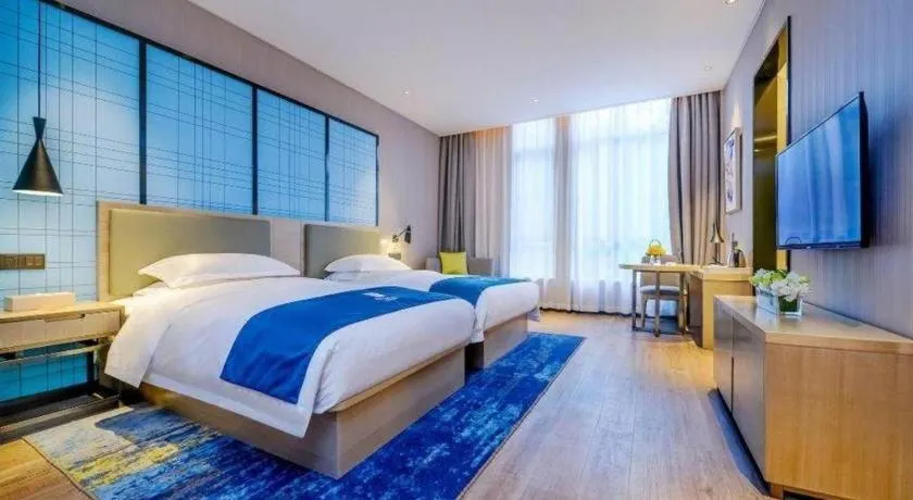 Bed in Echarm Hotel Anshun High-speed Railway Station Jichang Road