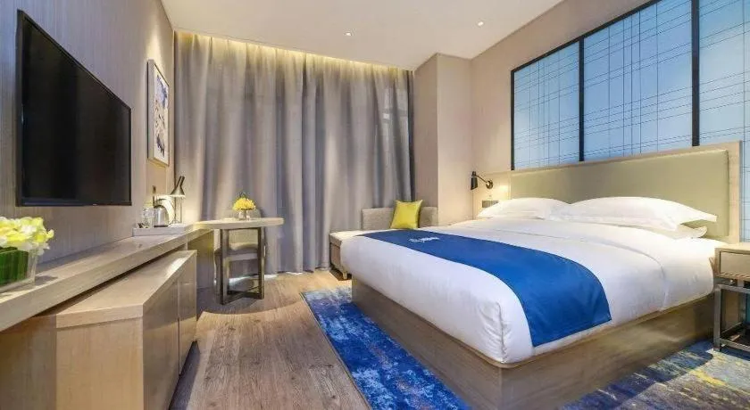 Bed in Echarm Hotel Anshun High-speed Railway Station Jichang Road