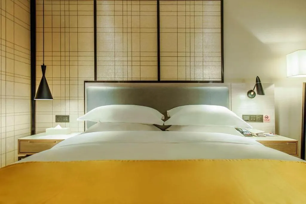 Bed in Echarm Hotel Anshun High-speed Railway Station Jichang Road