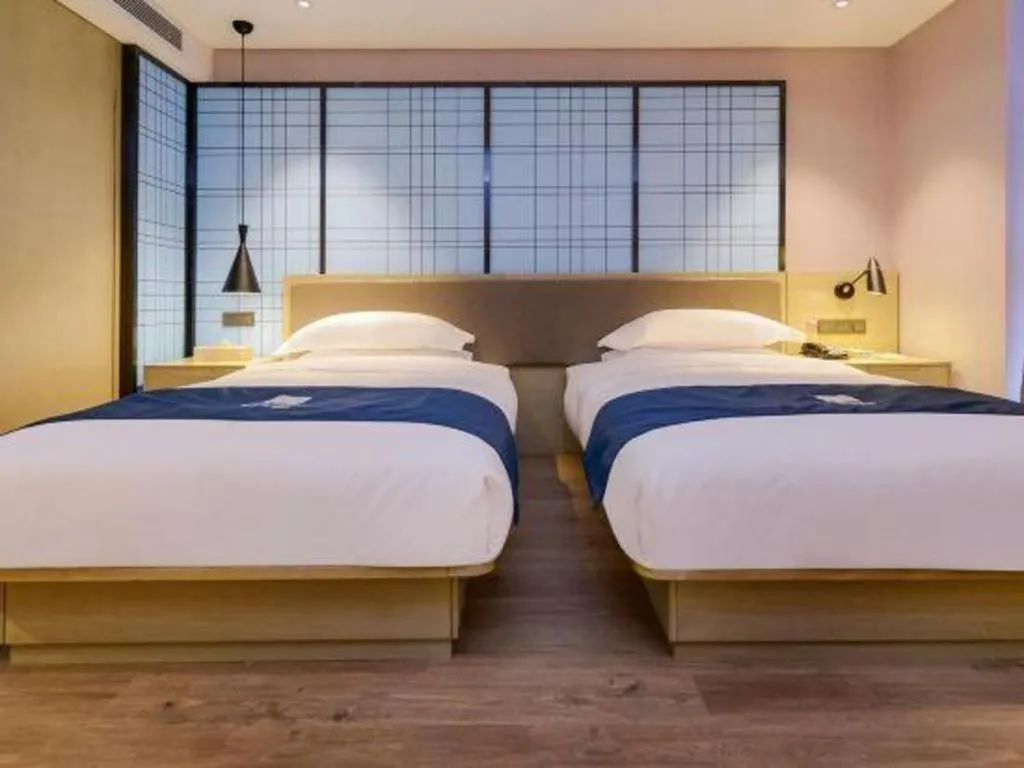 Bed in Echarm Hotel Anshun High-speed Railway Station Jichang Road