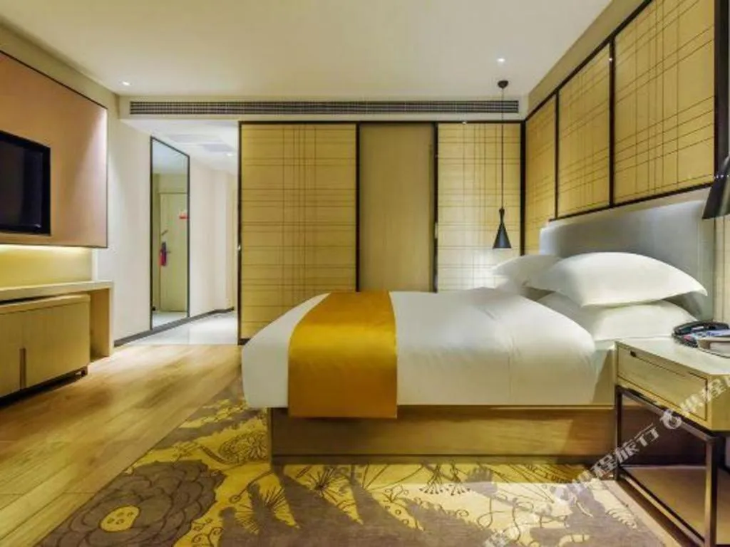 Bed in Echarm Hotel Anshun High-speed Railway Station Jichang Road