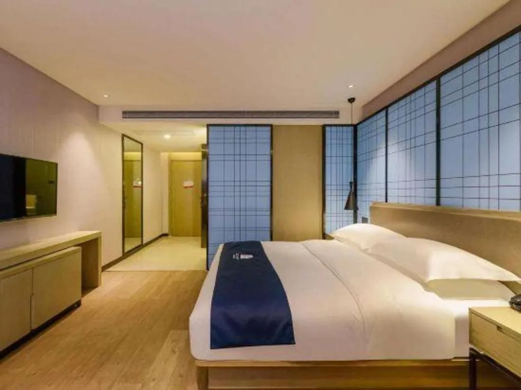 Bed in Echarm Hotel Anshun High-speed Railway Station Jichang Road